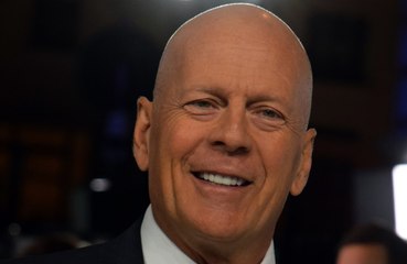Bruce Willis visite le gratte-ciel de "Piège de cristal" 34 ans plus tard