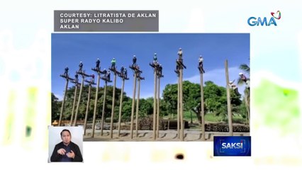 Mga linemen-in-training sa Aklan, hataw sa pagsayaw habang nasa taas ng poste at kable ng kuryente | Saksi