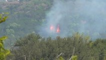 Firefighters brave intense heat, wind battling Texas fires