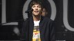 Louis Tomlinson says he is “immensely proud” of One Direction