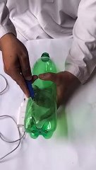 how to make a mobile phone stand using a plastic bottle.