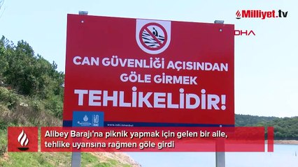 Tehlikeli uyarısına rağmen gölde yüzdüler