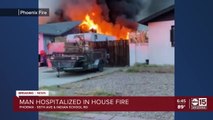 Man hospitalized in house fire