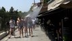Tourists battle heat in Athens