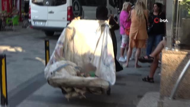 Yabancı uyruklu dilenci kadından basın mensubuna Seni bir daha burada görmeyeceğim tehdidi