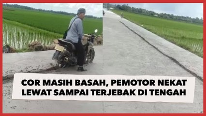 Jalanan Masih Cor Basah, Pemotor Nekat Lewat Sampai Terjebak di Tengah