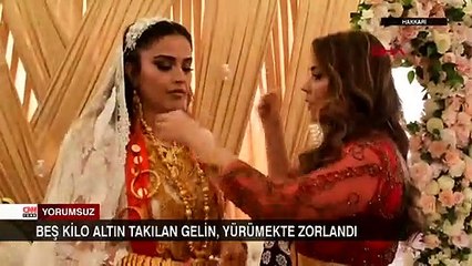 5 kilo altın takılan gelin, yürümekte zorlandı