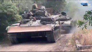 Russian Forces Capturing A Stalled Ukrainian Tank