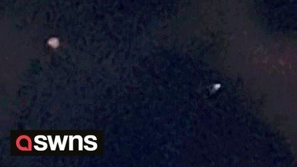 UK doctor left baffled after filming two bizarre UFOs floating above his home