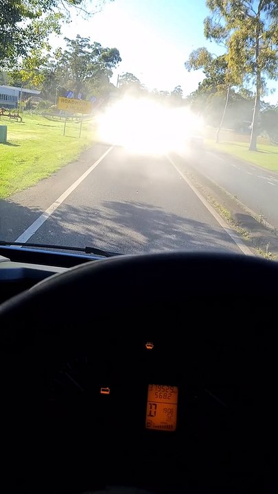 Smoke Spewing Car Nearly Causes Crash