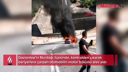 Bariyerlere çarpan otomobil alev aldı
