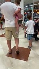 Bull Terrier Gets Pulled Along During Shopping Trip