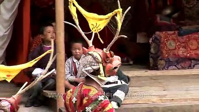 Bhutanese monks perform ritual Cham dance in Bhutan