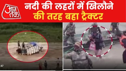 Video of truck full with trash floating in a water like toy