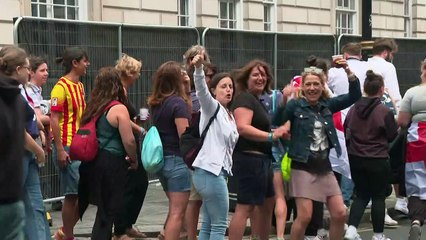 Football supporters arrive at Trafalgar Sq Fan Zone