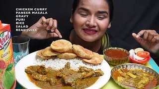 Indian food eating  Puri, rice and chicken curry