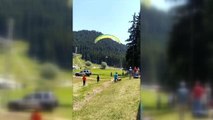 Yamaç paraşütü pilotu rüzgar yön değiştirince piknik yapanların üzerine indi