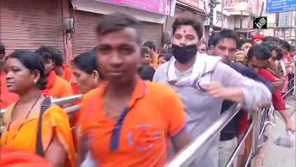 UP: Devotees queue up outside Kashi Vishwanath Temple on 3rd Monday of Sawan
