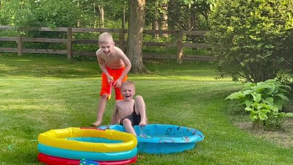 Three brothers fall one after the other while playing in the backyard