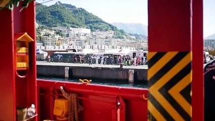 Migrant dispatch: From on board a rescue ship in the Mediterranean, migrants take their first step onto European land in Italy