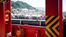 Migrant dispatch: From on board a rescue ship in the Mediterranean, migrants take their first step onto European land in Italy