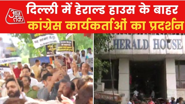 Cong workers protest outside Herald House against ED raid
