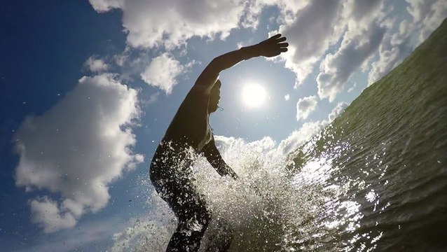 How surf therapy is helping people battle PTSD on the waves of Lake Michigan
