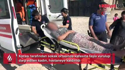 Sokak ortasında vahşet! Karısının kafasına taşla vurdu