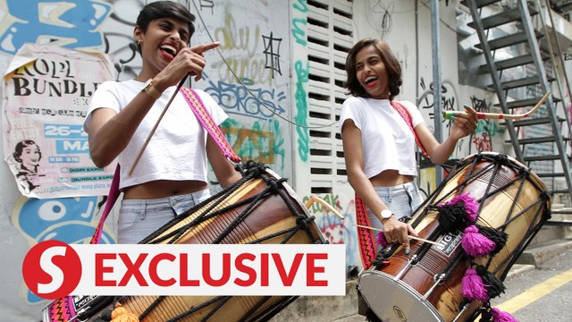 Malaysian twins teach themselves to play the dhol, breaking stereotypes along the way