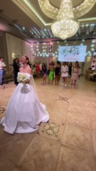 Bride's Bouquet Gets Stuck in Chandelier