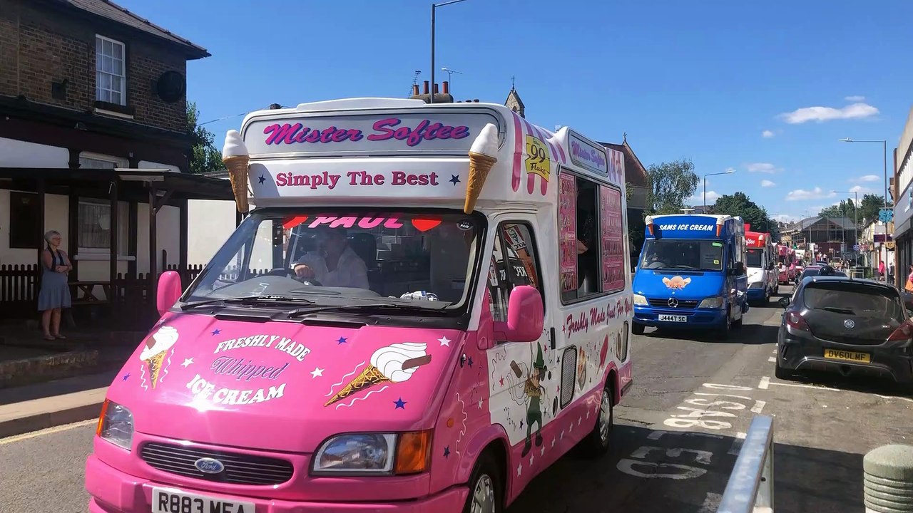 A procession through Gravesend of ice cream vans for Paul Mannerings