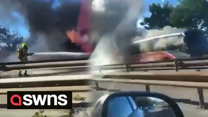 Dramatic footage captures bus billowing smoke and flames after catching fire while in service