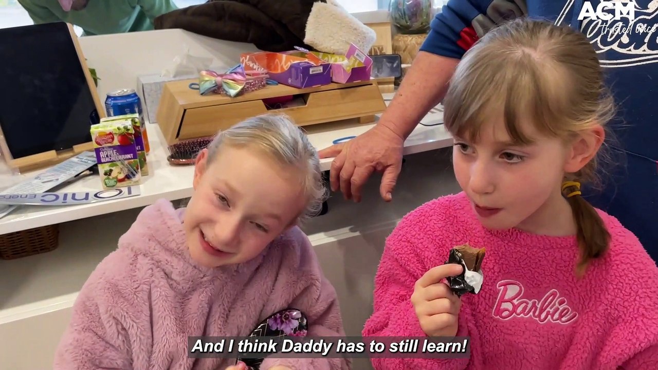 Fathers learn how to tie their daughters' hair at special workshop | August 8, 2022 | Canberra Times
