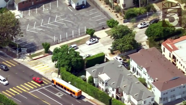 Shooting suspect in custody after police pursuit in Mid-Wilshire area of Los Angeles
