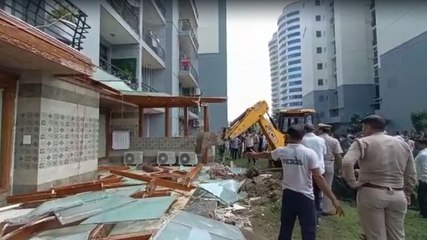 Bulldozer action against 'BJP worker' who assaulted woman at Noida society