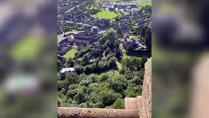 Freeeeedom! Thrill-seekers dressed in kilts base jump from the top of the William Wallace Monument in Stirling