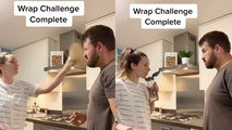 Laugh out loud while watching this couple do the hilarious wrap slap challenge