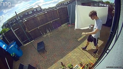 Man Carelessly Lifts Table and Breaks Glass