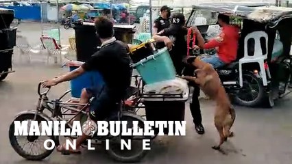 Davao City Police EOD-K9 unit inspect delivery boxes in Roxas Night Market