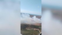 Çanakkale haberleri | ÇANAKKALE - Bozcaada'da çöplük alanda çıkan yangına müdahale ediliyor