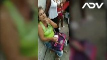 Una mujer se desmaya en la cola para comprar jabón en La Habana.