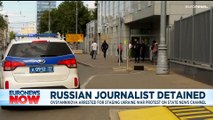 Russia journalist who made TV Ukraine war protest arrested and has home raided