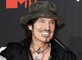 Mötley Crüe's Tommy Lee Posts Penis Pic to Social Media: 'Ooooopppsss'