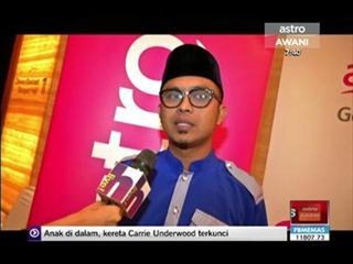 Mawi pakai baju Raya rekaan sendiri