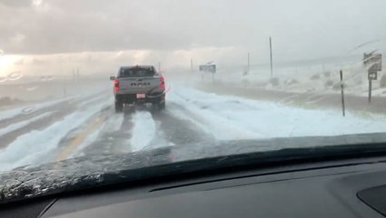 Summer hailstorm creates winter wonderland