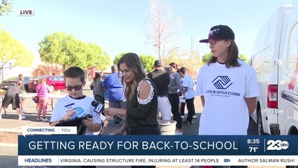 Volunteers help students get ready for back to school