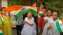 PM Modi's mother distributes national flags, joins 'Har Ghar Tiranga' campaign