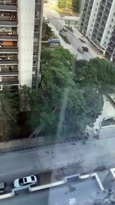 Police Respond as Woman Throws Things Off Balcony