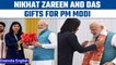 PM Modi receives boxing gloves, traditional gamocha from CWG 2022 achievers | Oneindia news *News