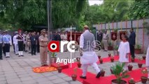 Defence Minister Rajnath Singh hoists national flag at his residence in New Delhi